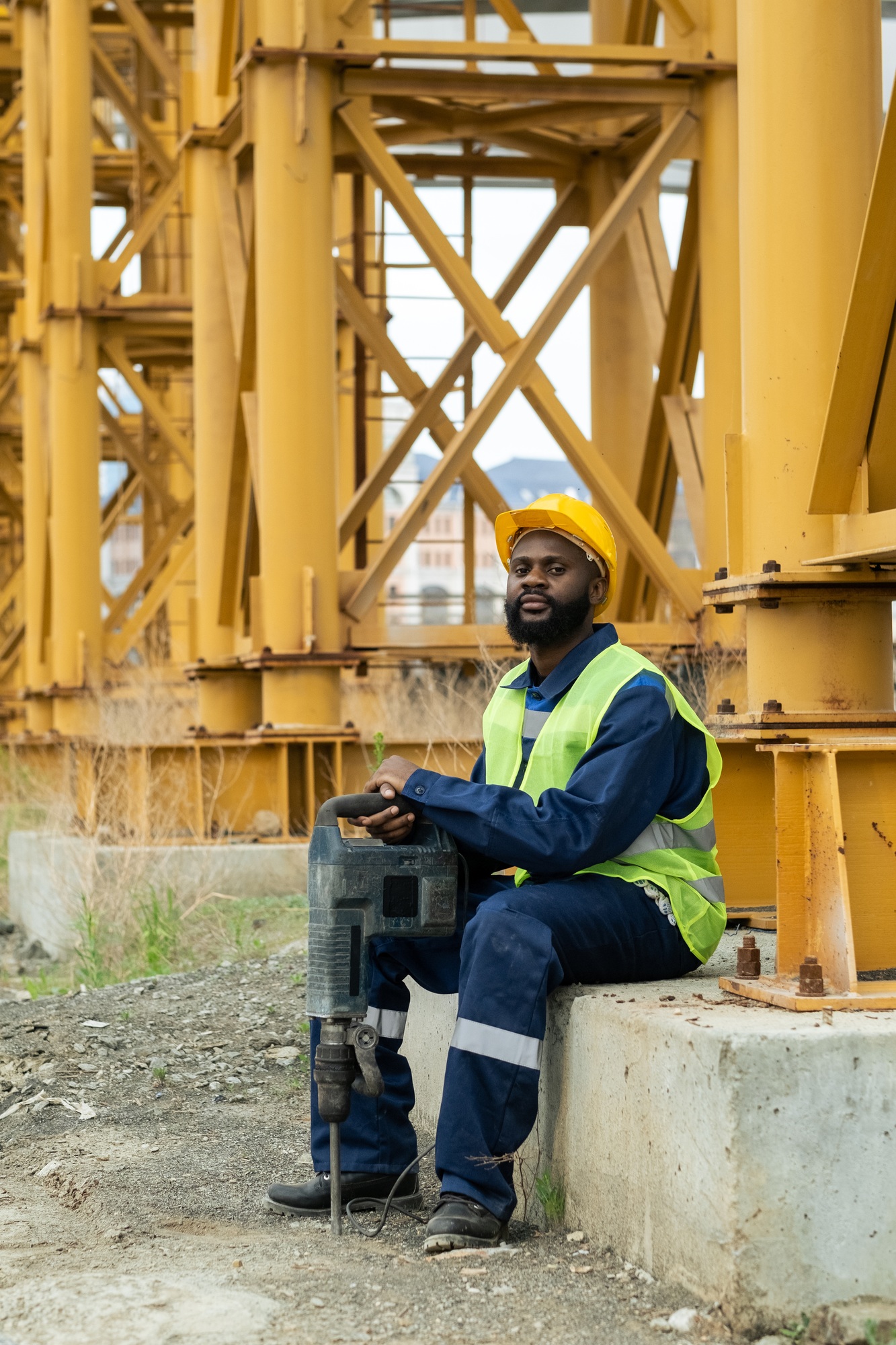 Construction worker sitting outdoors